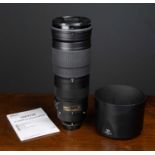 A Nikon AF-S NIKKOR 200-500mm 1:5.6E ED VR Lens with hood.Condition report: Good condition no