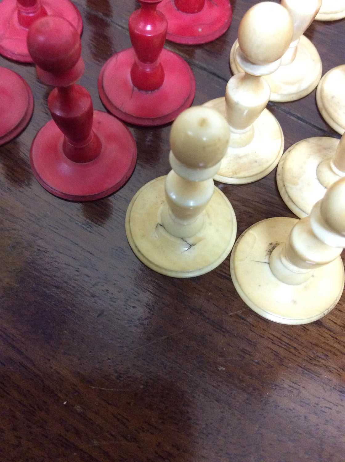 A 19th century turned and stained ivory chess set, a turned ebony and boxwood chess set, a - Image 16 of 17