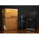 A Nikon AF-S Nikkor 70-200mm 1:2.8G II ED VR N lens serial number 20222076 with lens cap, hood