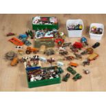 A collection of Britains die-cast lead farm animals to include cattle, horses, figures, farm