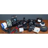 A collection of cameras and accessories to include a Nikon F-801 with AF Nikkor 28-85mm lens, a Sony