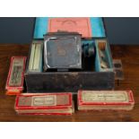 A magic lantern projector in original case with three boxes of glass slides,Condition report: