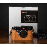 A Leica M (TYP 240) Digital Rangefinder Body, in black, serial number 4701863. Includes Leica tan