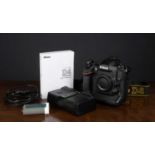 A Nikon D4 Digital camera, serial number 2041911 with charger MH-26.Condition report: Good, powers