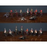 Three Britains late19th/ early 20th Century Lancers and other mounted soldiers and a cast metal part