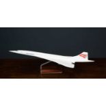 A vintage plastic model of British Airways Concorde on a wooden stand, 61cm longCondition report: