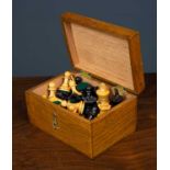 A turned ebony and boxwood chess set, the king 7.5cm in heightCondition report: in good condition, a