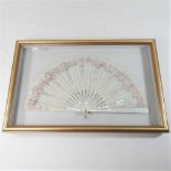 An early 20th century hand painted silk fan,