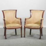 A pair of 20th century continental cream upholstered armchairs,