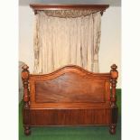 A Victorian mahogany half tester bedstead