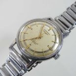 A 1950's Longines Conquest steel cased automatic gentleman's wristwatch,