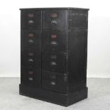 An early 20th century black painted filing cabinet,
