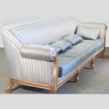 A large gilt framed pale blue upholstered sofa,