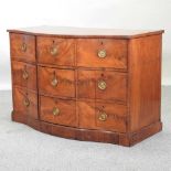 A large 19th century mahogany and crossbanded serpentine chest,