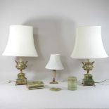 A pair of green onyx and brass mounted table lamps,