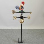 A metal cockerel weather vane