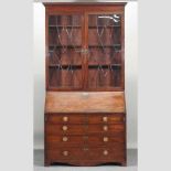 A George III mahogany bureau bookcase, 113cm