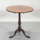 An antique oak occasional table,