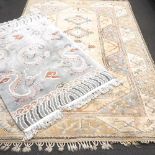 A modern oriental woollen carpet, on a cream ground,