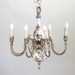 A floral painted pottery and brass eight branch chandelier,