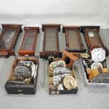 A collection of clock cases and parts