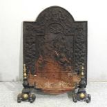 A cast iron fire back,