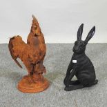 A rusted metal model of a cockerel, together with a model of a hare