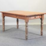 A rustic pine dining table,
