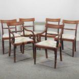 A set of six Regency carved mahogany dining chairs,