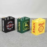 Three painted metal petrol cans,