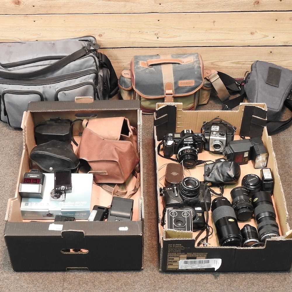 A collection of various cameras and lenses