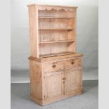 An early 20th century stripped pine dresser,
