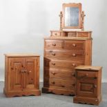 A modern pine chest of drawers,