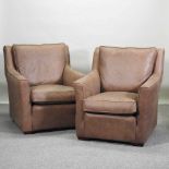 A pair of modern brown upholstered armchairs