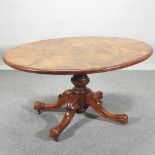 A Victorian walnut oval loo table,