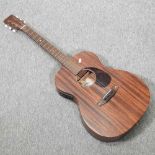 A Sigma acoustic guitar,