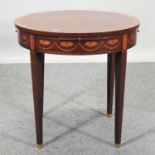 A reproduction inlaid occasional table,