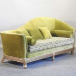 A gilt framed and green upholstered sofa,