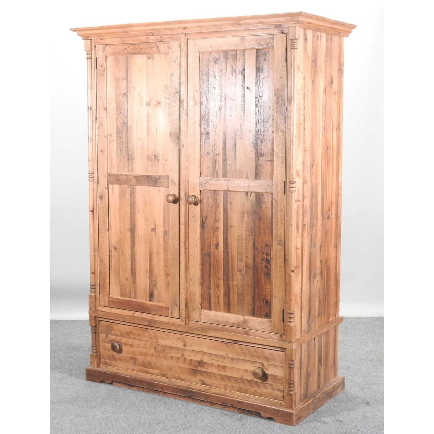 A modern rustic pine double wardrobe,