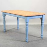 A pine and blue painted kitchen table,