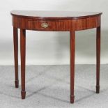 A George III style mahogany half round side table,