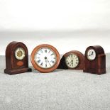 An Edwardian mahogany and inlaid mantel clock,