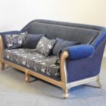 A modern gilt framed and blue upholstered sofa,