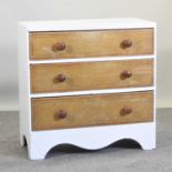A painted and pine chest of drawers,