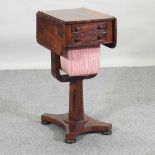 A 19th century rosewood work table,