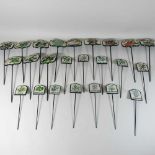 A set of six painted metal garden vegetable markers,