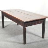 An 18th century and later oak plank top dining table,