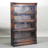 An early 20th century Globe Wernicke graduated four tier glazed sectional bookcase