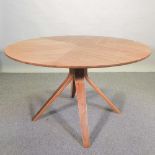 A contemporary laminated dining table,