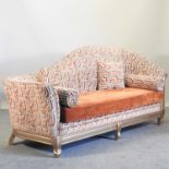 A gilt framed and geometric design upholstered sofa,